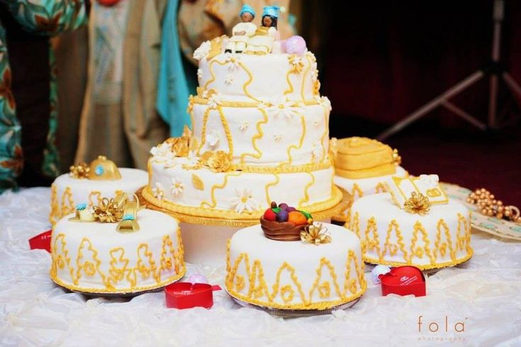 Nigerian Traditional Wedding Cakes
 Gold and white Nigerian wedding cake for traditional