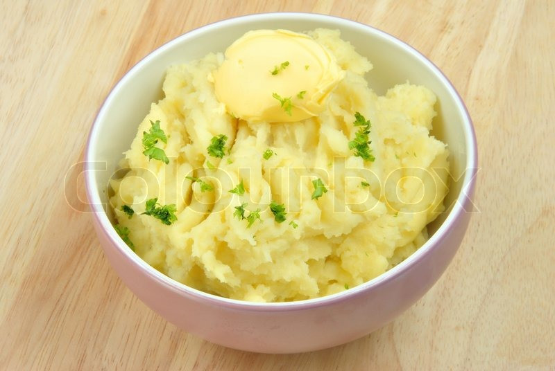 Organic Mashed Potatoes
 Mash potato with organic parsley in a bowl