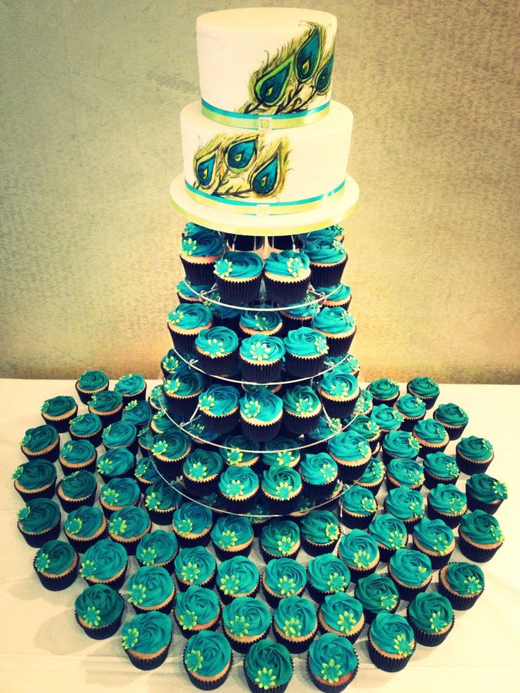 Peacock Wedding Cake With Cupcakes
 Best 25 Peacock wedding cake ideas on Pinterest