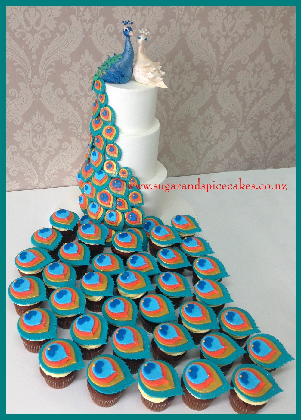 Peacock Wedding Cake With Cupcakes
 Peacock Wedding Cake With Matching Cupcakes CakeCentral