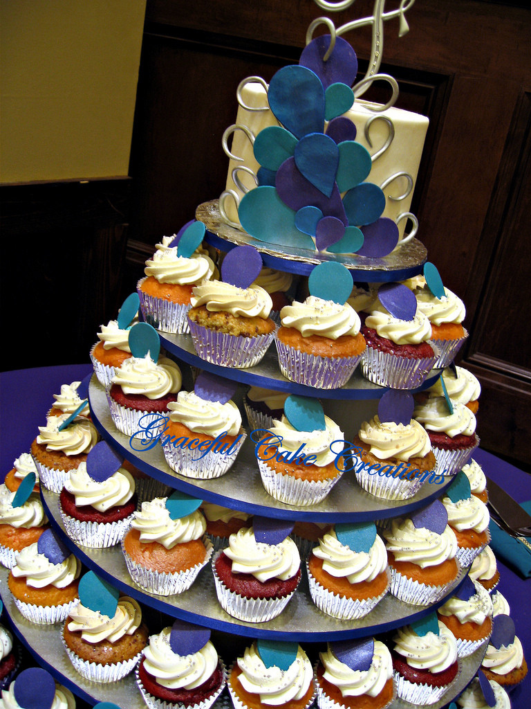 Peacock Wedding Cake With Cupcakes
 Peacock Themed Cupcake Wedding Cake a photo on Flickriver