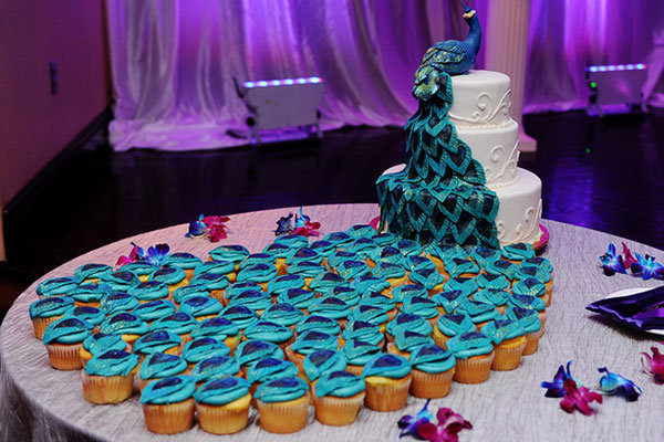 Peacock Wedding Cake With Cupcakes
 of the Day