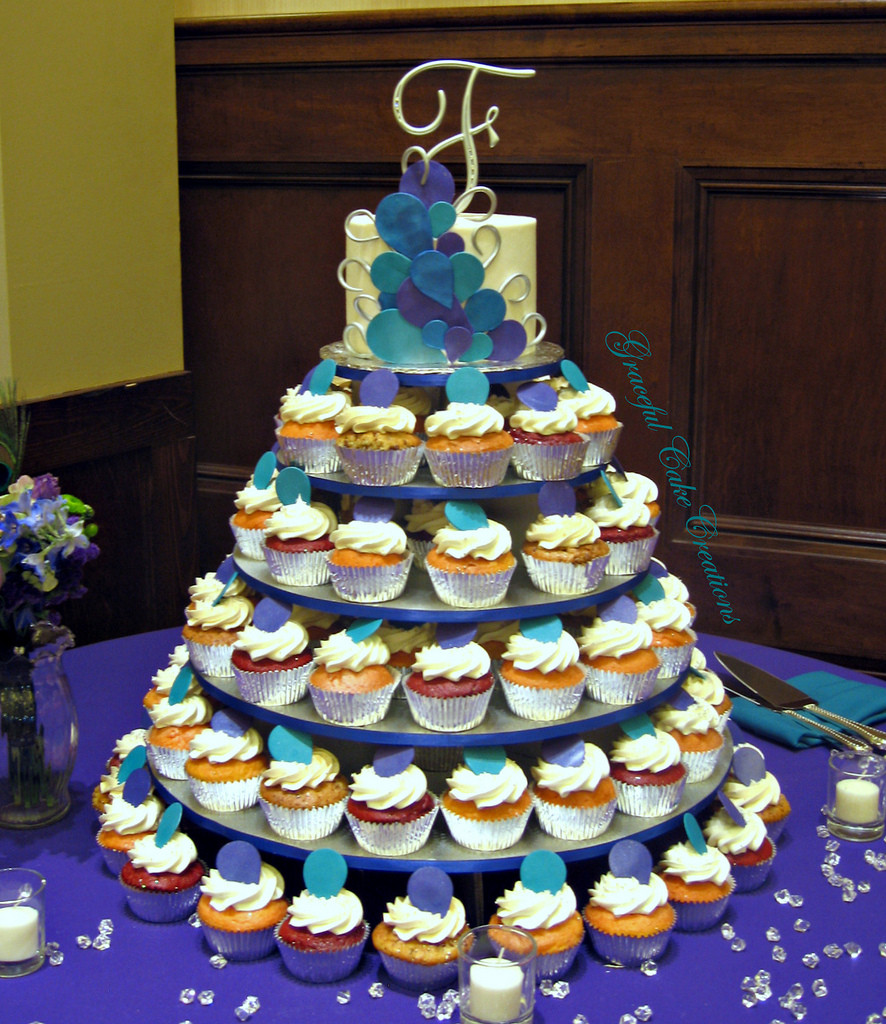 Peacock Wedding Cake With Cupcakes
 Peacock Themed Cupcake Wedding cake a photo on Flickriver