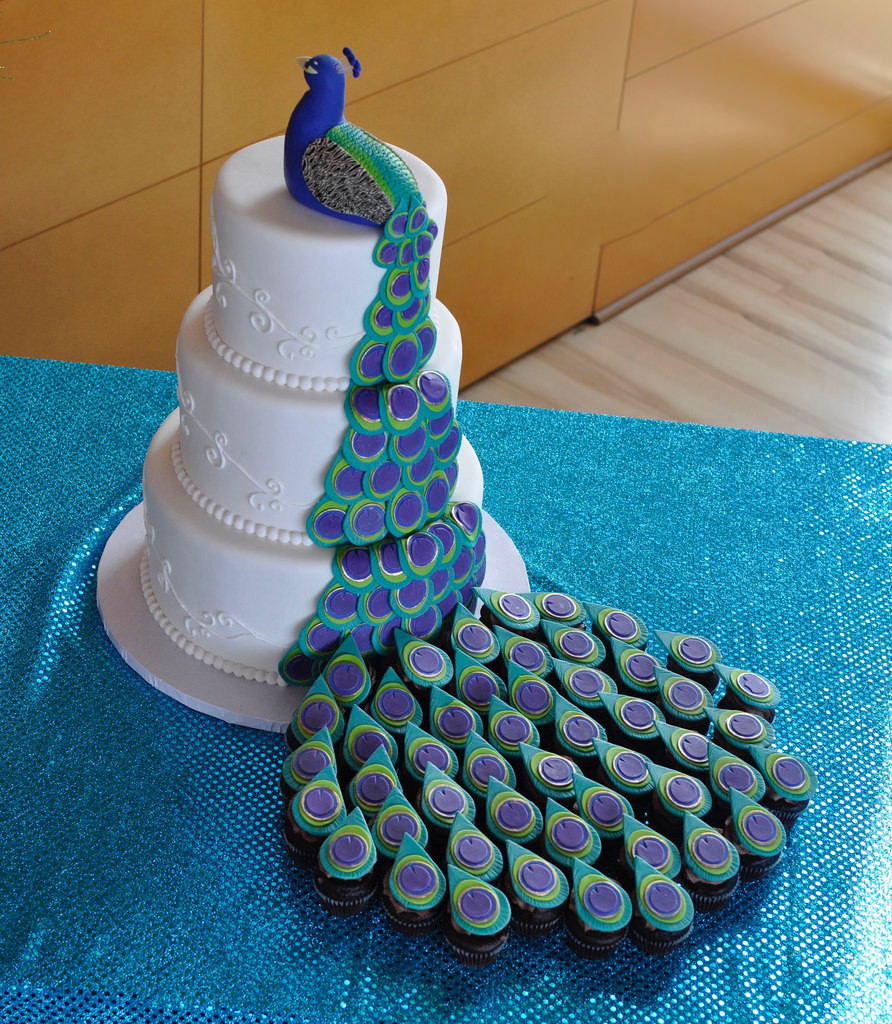 Peacock Wedding Cake With Cupcakes
 Peacock wedding cake with mini cupcakes Jenny Wenny