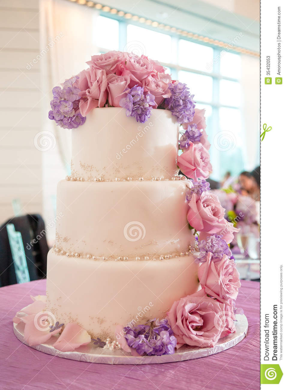 Pink And Purple Wedding Cakes
 Wedding Cake With Pink And Purple Flowers Stock Image