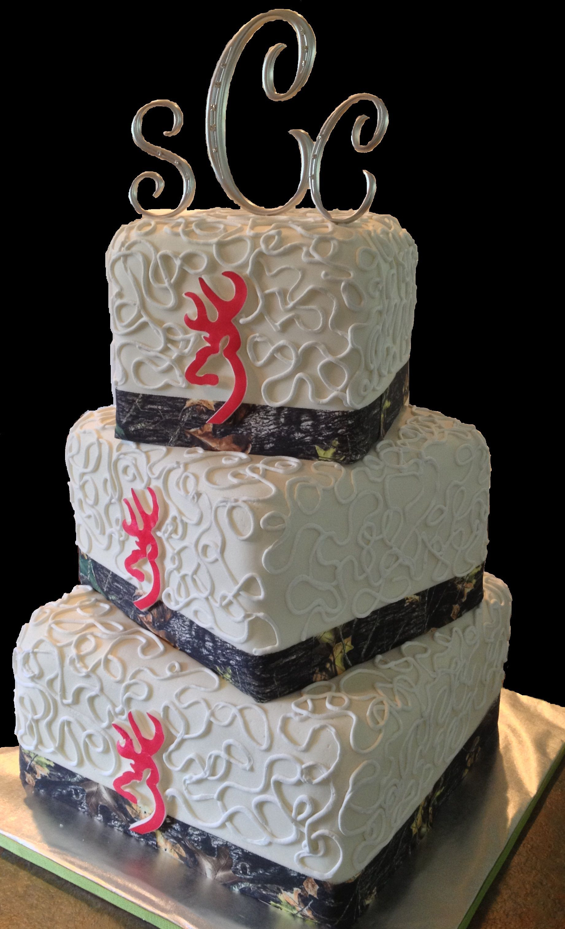 Pink Camouflage Wedding Cakes
 Camo and pink Browning logo wedding cake