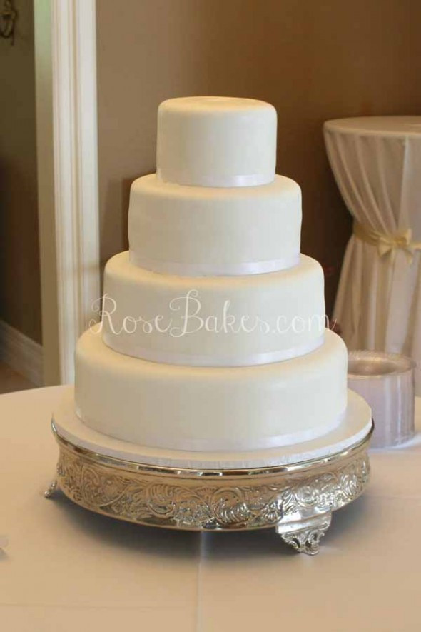 Plain White Wedding Cake
 White Wedding Cake with Cascading Fresh Flowers Rose Bakes