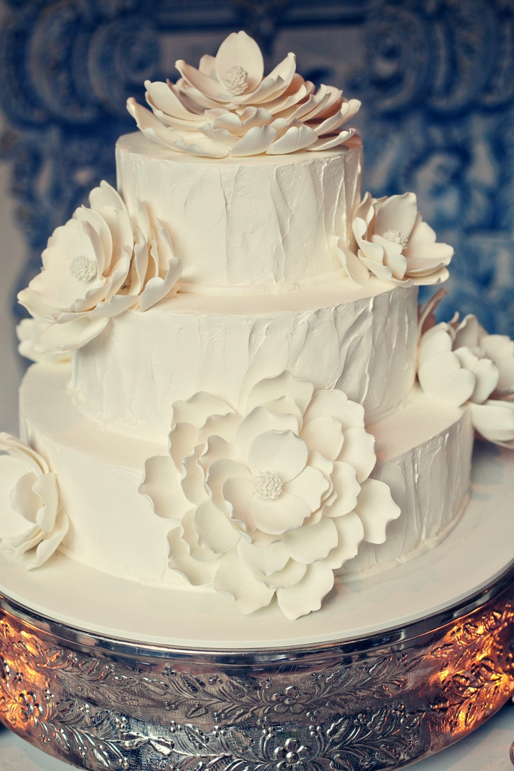 Portos Bakery Wedding Cakes
 White magnolia wedding cake Porto s Bakery