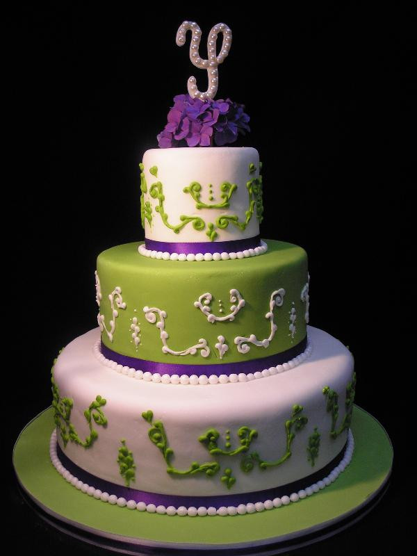 Purple And Green Wedding Cakes
 Round four tier fondant wedding cake ideas designs and