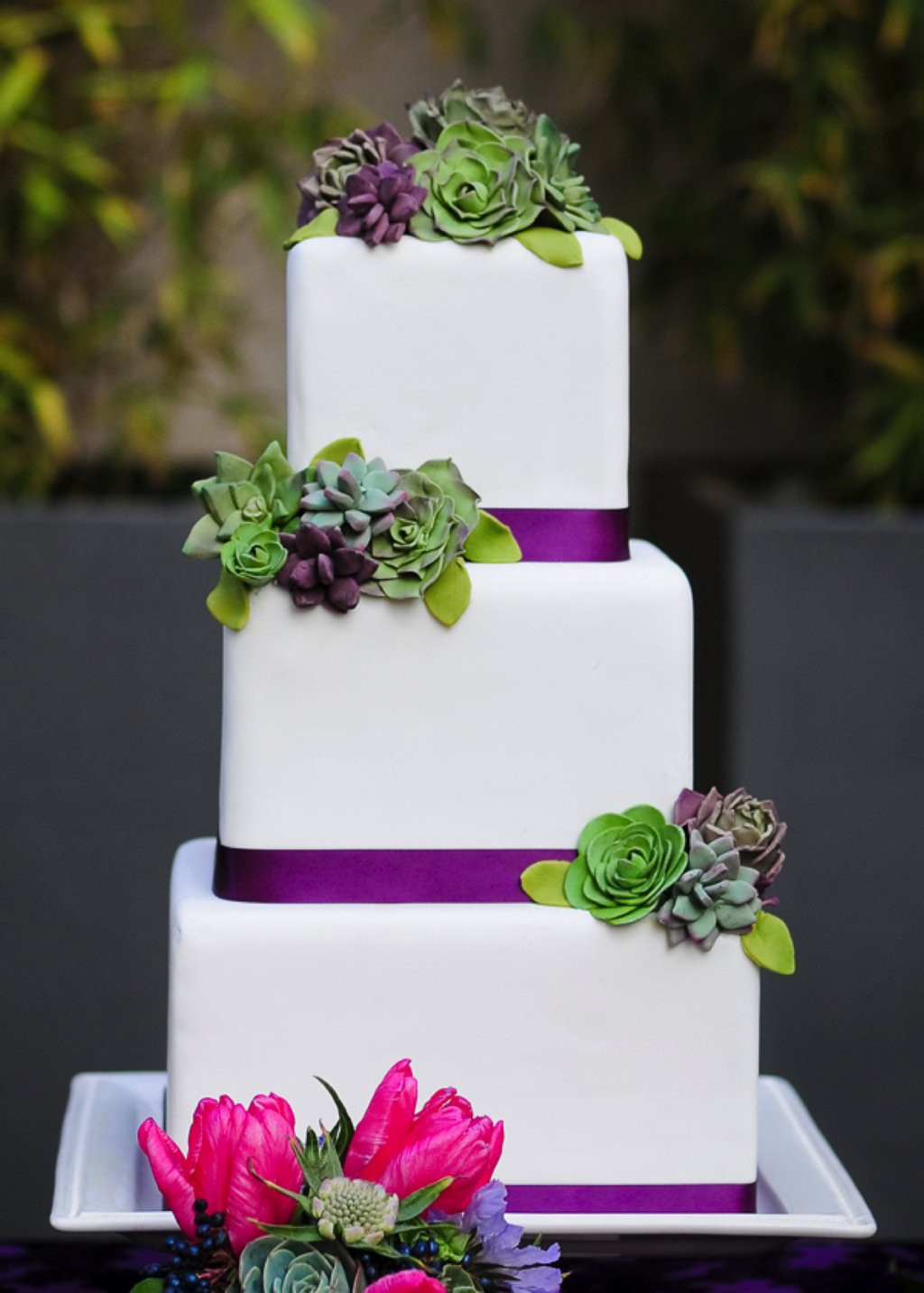 Purple And Green Wedding Cakes
 White wedding cake with pink purple and green details