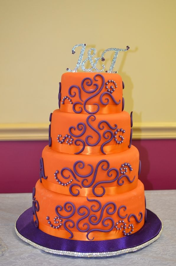 Purple And Orange Wedding Cakes
 4 tier wedding cake Orange with purple and silver accents