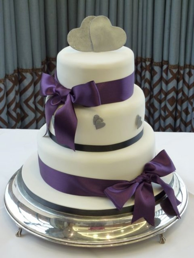 Purple And Silver Wedding Cakes
 Purple bows and silver hearts wedding cake