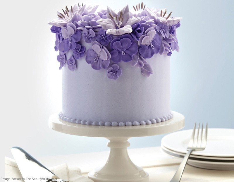 Purple And White Wedding Cakes
 Beautiful purple wedding cakes with floral details