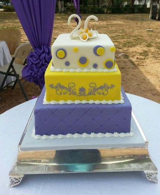 Purple And Yellow Wedding Cake
 Purple and yellow wedding cake Cake by SerwaPona