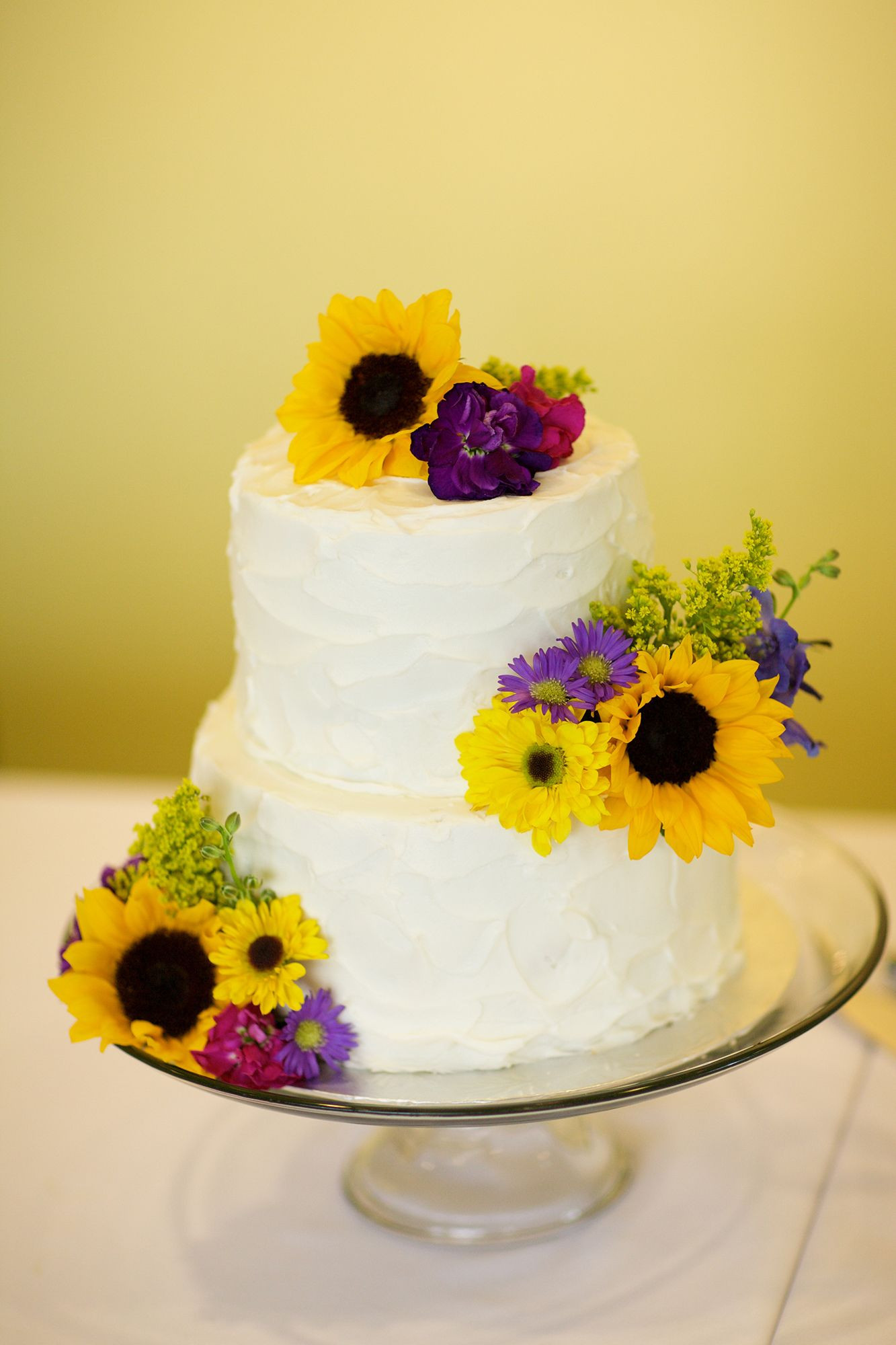 Purple And Yellow Wedding Cakes
 Yellow and Purple Flower Decorated Wedding Cake
