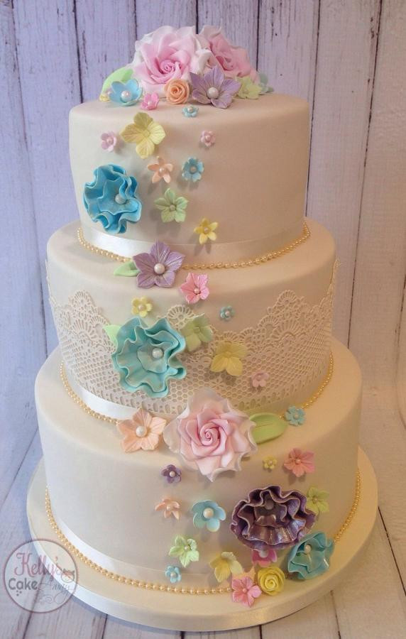 Rainbow Wedding Cakes
 Pastel rainbow flower cascade wedding cake cake by Kelly