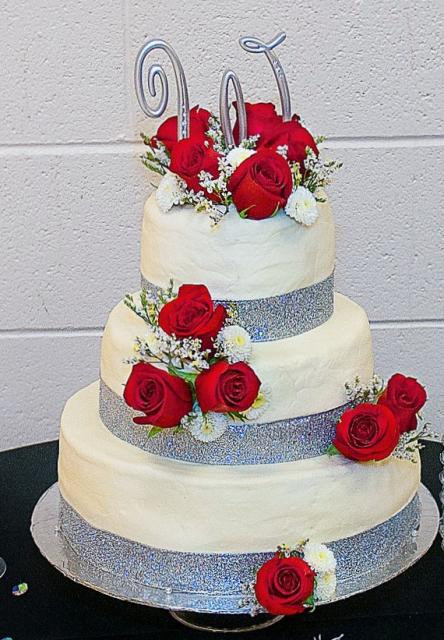 Red And Silver Wedding Cakes
 3 tier white wedding cake with fresh red roses and silver