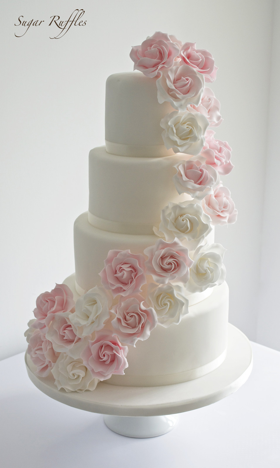 Rose Wedding Cakes
 Pink rose cascade wedding cake