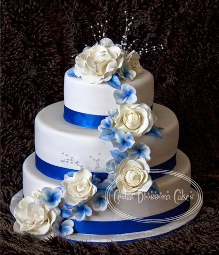 Royal Blue And White Wedding Cakes
 Royal Blue and white roses and frangipani wedding cake