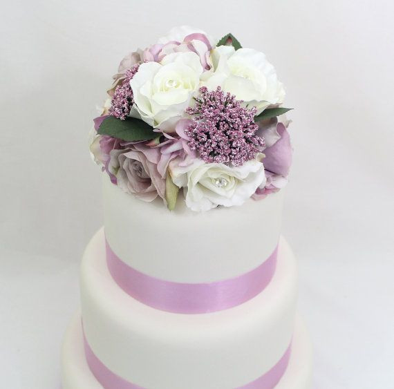 Silk Flowers For Wedding Cakes
 Top 25 ideas about It Tops the Cake Silk Floral Wedding