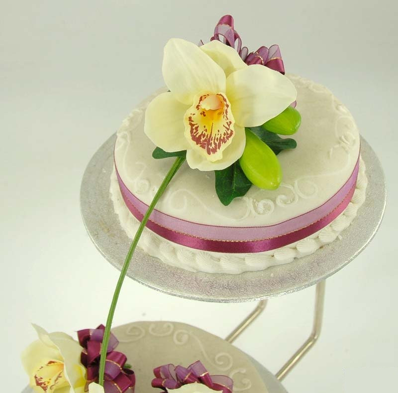 Silk Flowers For Wedding Cakes
 Ivory Silk Orchid Wedding Cake Flower Arrangement Sarah