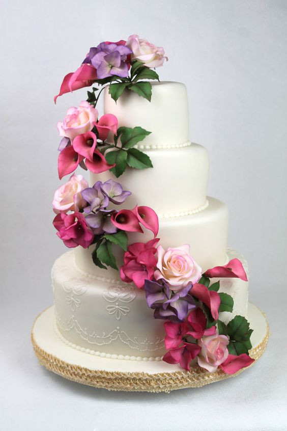 Silk Flowers For Wedding Cakes
 Traditional Wedding cake with artificial flower decor