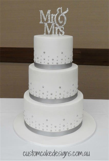 Silver And White Wedding Cake
 Simple Silver and White Wedding Cake cake by Custom Cake