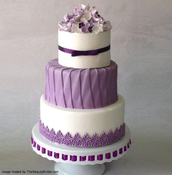 Simple Purple Wedding Cakes
 Beautiful purple wedding cakes with floral details