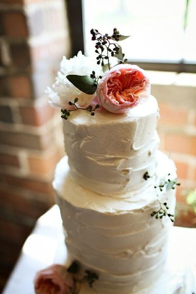 Simple Rustic Wedding Cakes
 Simple rustic looking wedding cake topped with peonies