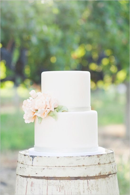 Simple Two Tier Wedding Cakes
 Simple two tier white wedding cake with a flower on the