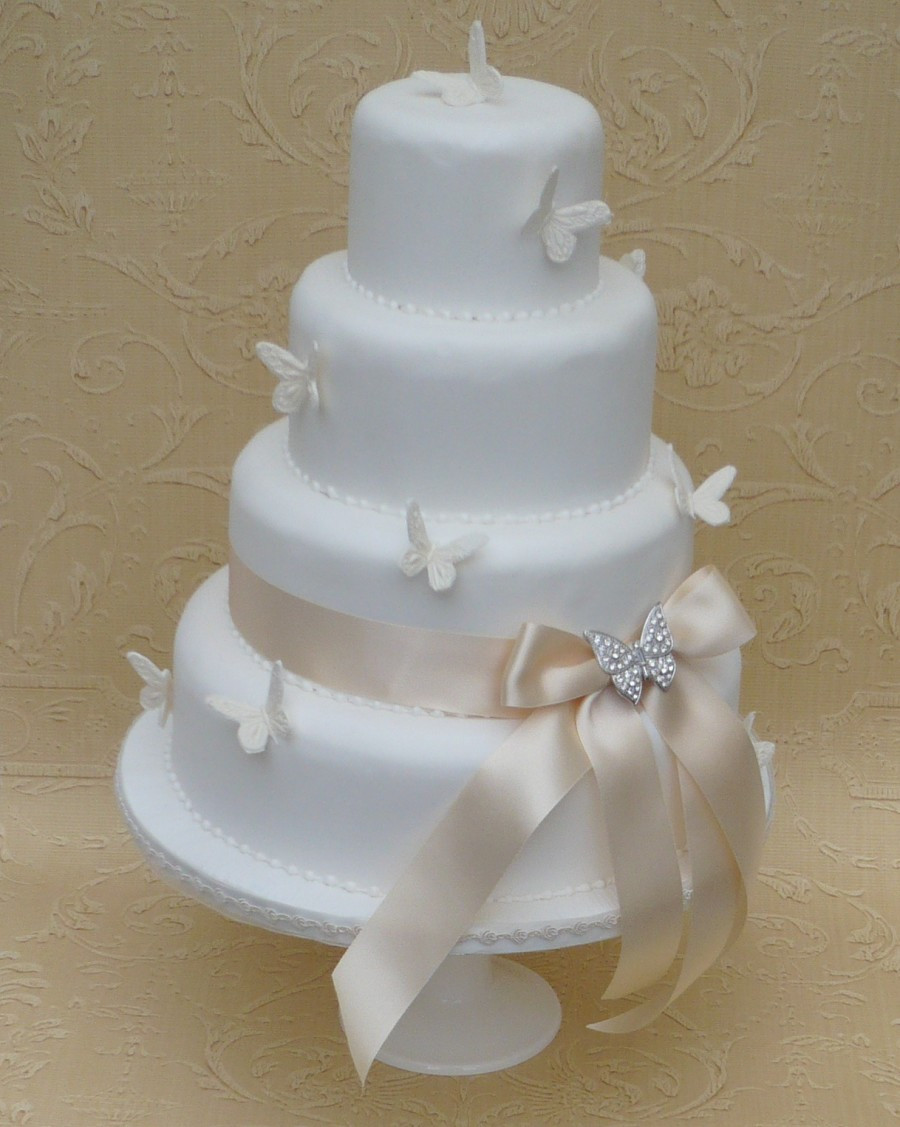 Simple White Wedding Cake
 Butterfly Cakes beautiful bright tasty MessageNote