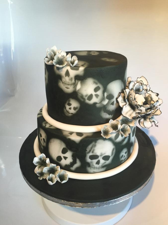Skeleton Wedding Cakes
 Skull and flowers wedding cake cake by Maria Louise