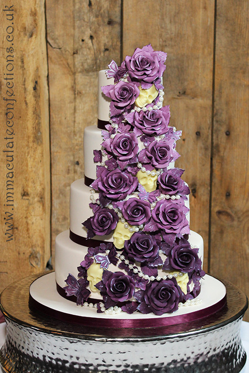 Skull Wedding Cakes
 Plum Roses and Chocolate Skulls Wedding Cake Cakes by