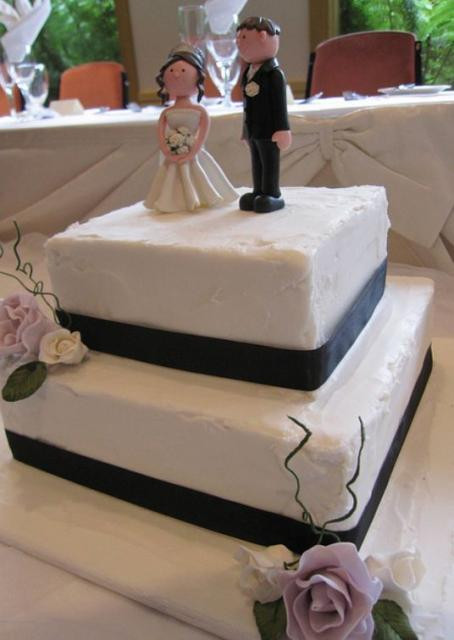 Small Square Wedding Cakes
 Two tier square white wedding cake with black band and