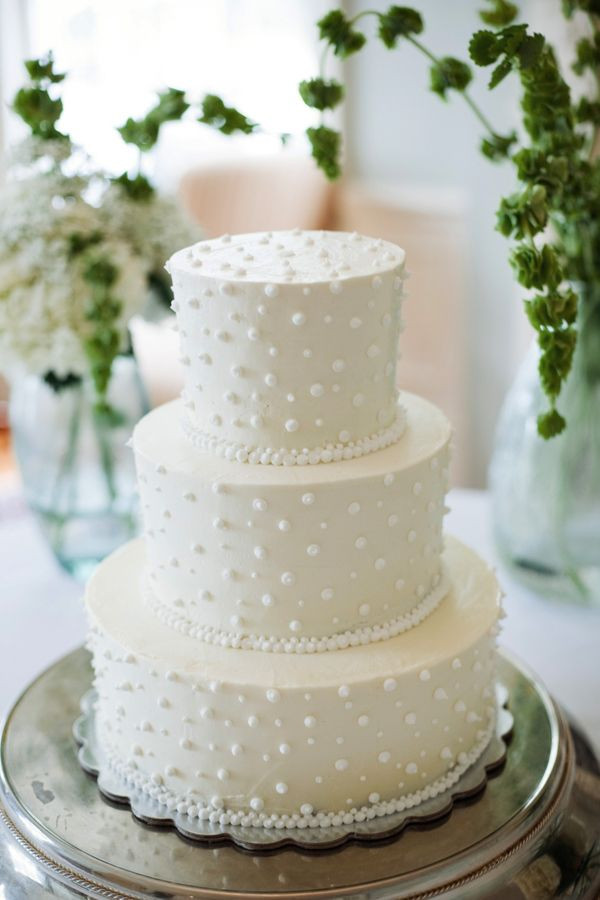 Swiss Dot Wedding Cakes
 classic white wedding cake with swiss dots