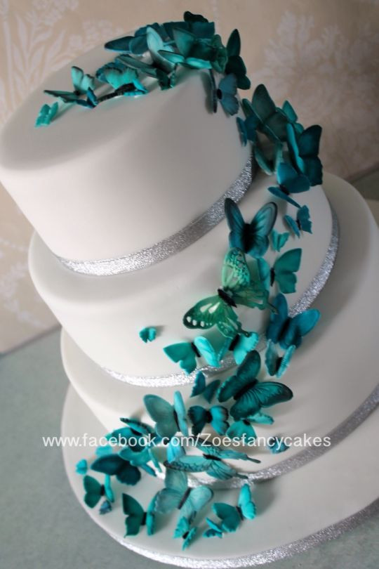 Teal Wedding Cakes
 Teal coloured butterfly wedding cake cake by Zoe s Fancy