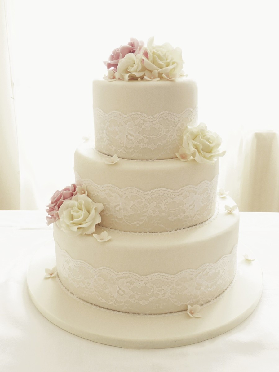 Three Tear Wedding Cakes
 Ivory Roses And Lace Three Tier Wedding Cake CakeCentral