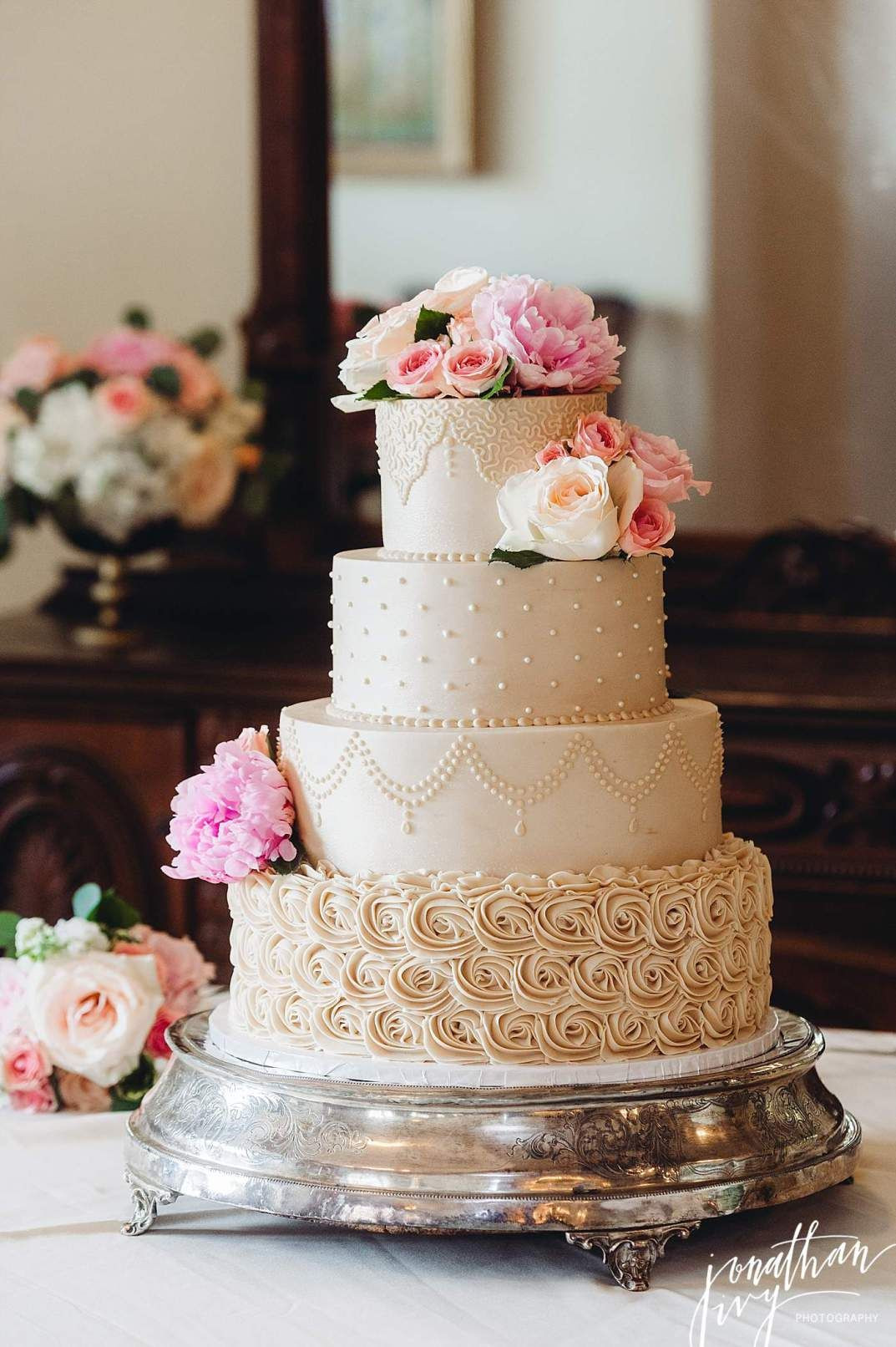 Top Tier Wedding Cakes
 Beautiful beige 4 tier buttercream wedding cake