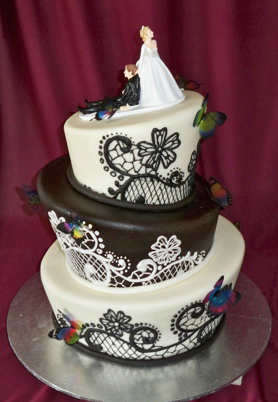 Topsy Turvey Wedding Cakes
 Black And White Topsy Turvy Wedding Cake With Butterflies