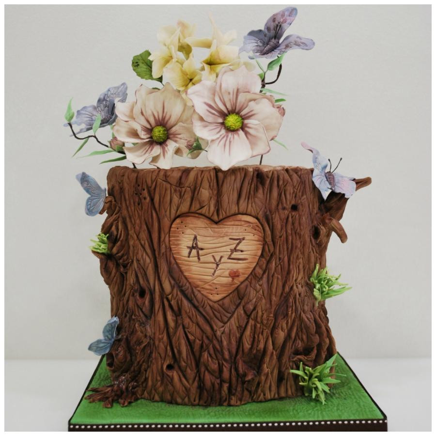 Tree Bark Wedding Cakes
 Nature at its best tree bark flowers & butterflies