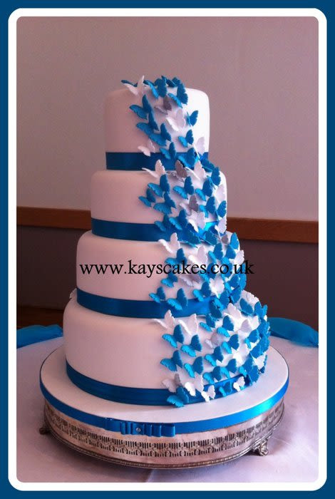 Turquoise And White Wedding Cakes
 Deep Turquoise & White Butterfly Cascade Wedding Cake