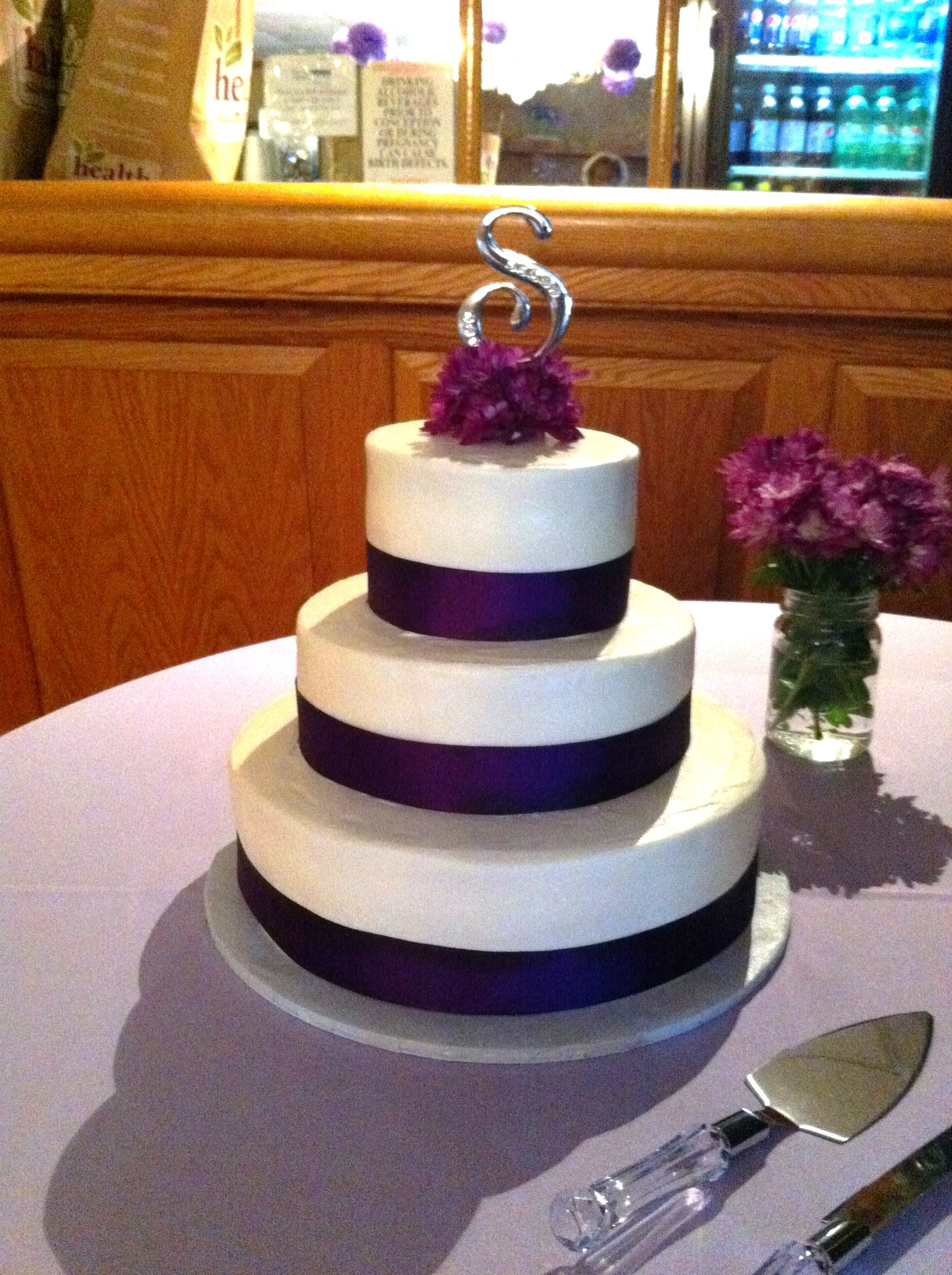 Wedding Cake Purple And White
 Classic White Wedding Cake w Purple Decorations