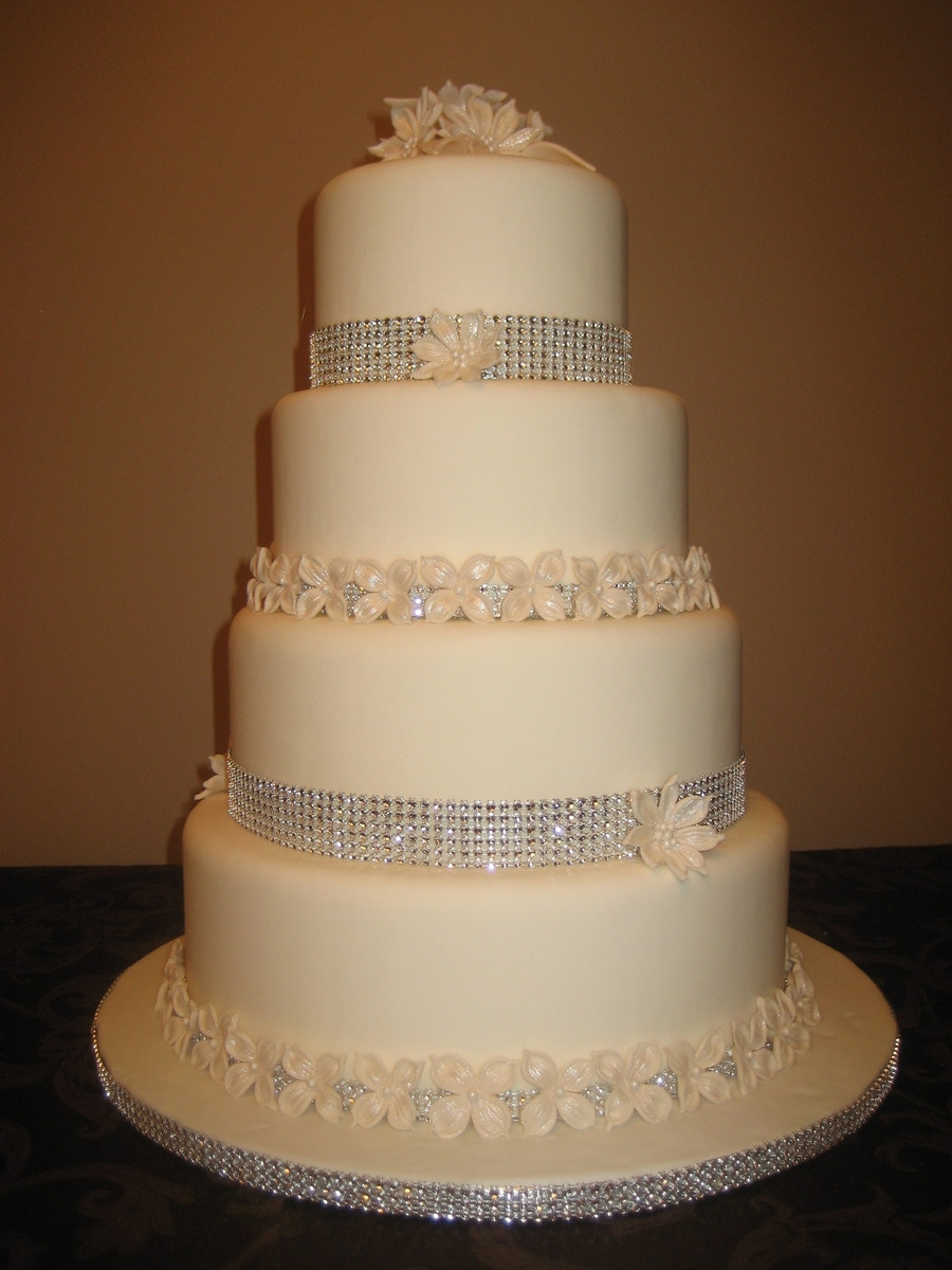 Wedding Cakes 4 Tier
 4 Tier Wedding Cake With Flowers And Diamond Wrap