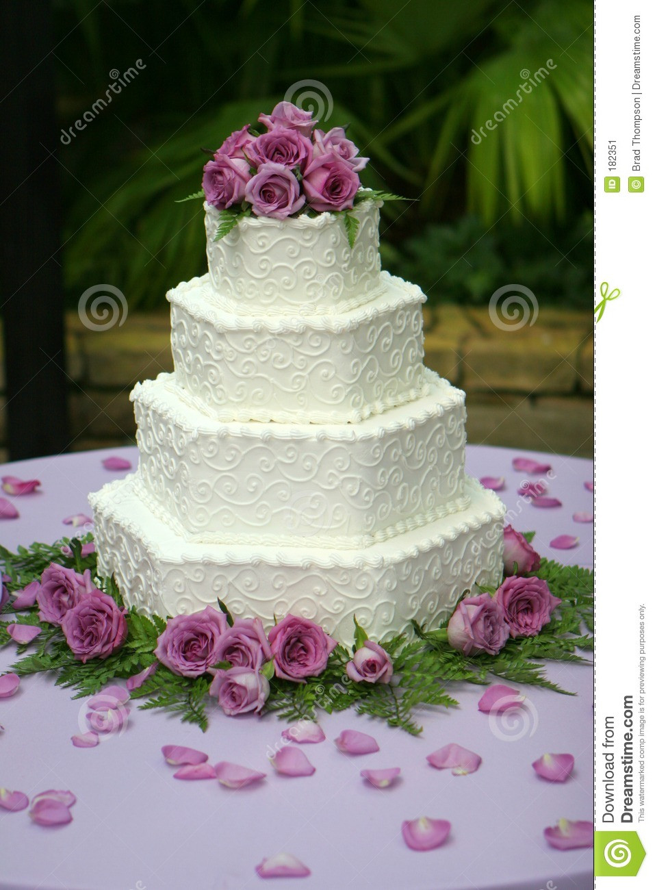 Wedding Cakes Purple Flowers
 Tiered Wedding Cake With Purple Flowers Stock Image