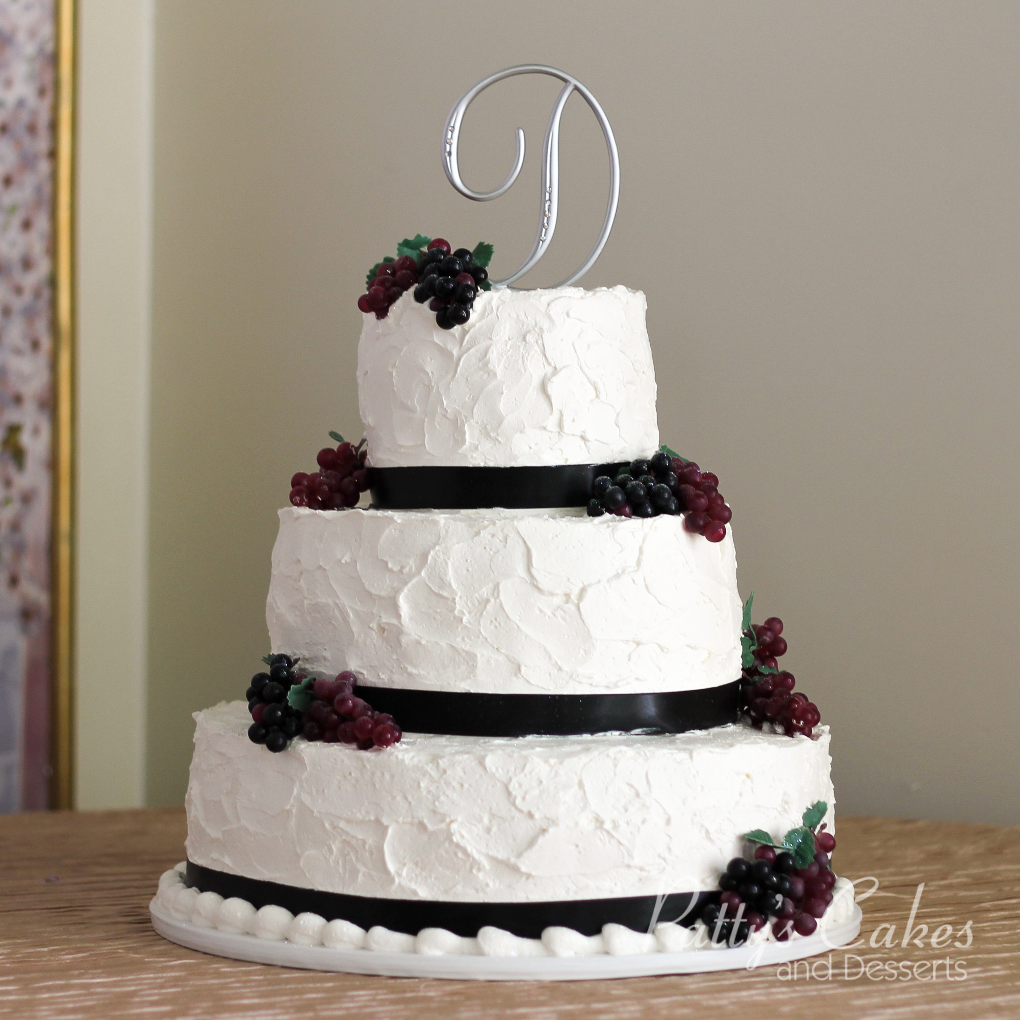 Wedding Cakes Ribbon
 of a wedding cake textured grapes ribbon black white