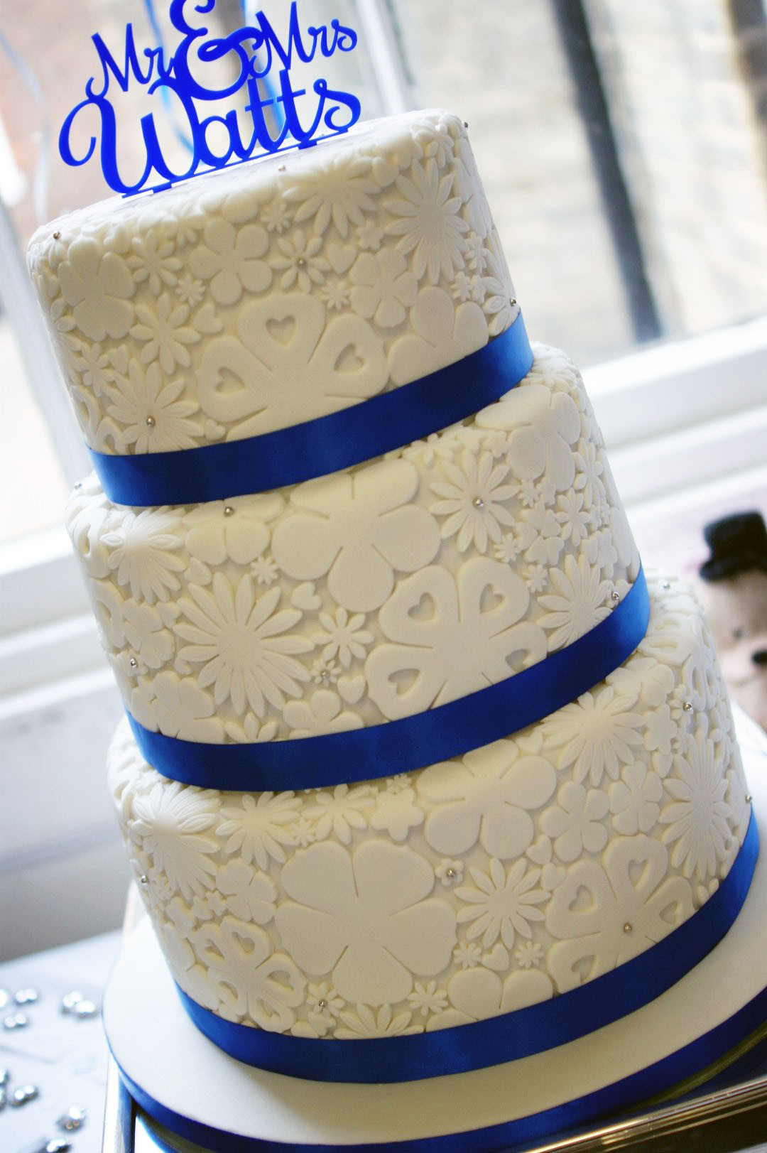 Wedding Cakes Royal Blue
 Royal Blue Flower Stamp 3 Tier Wedding Cake Bakealous