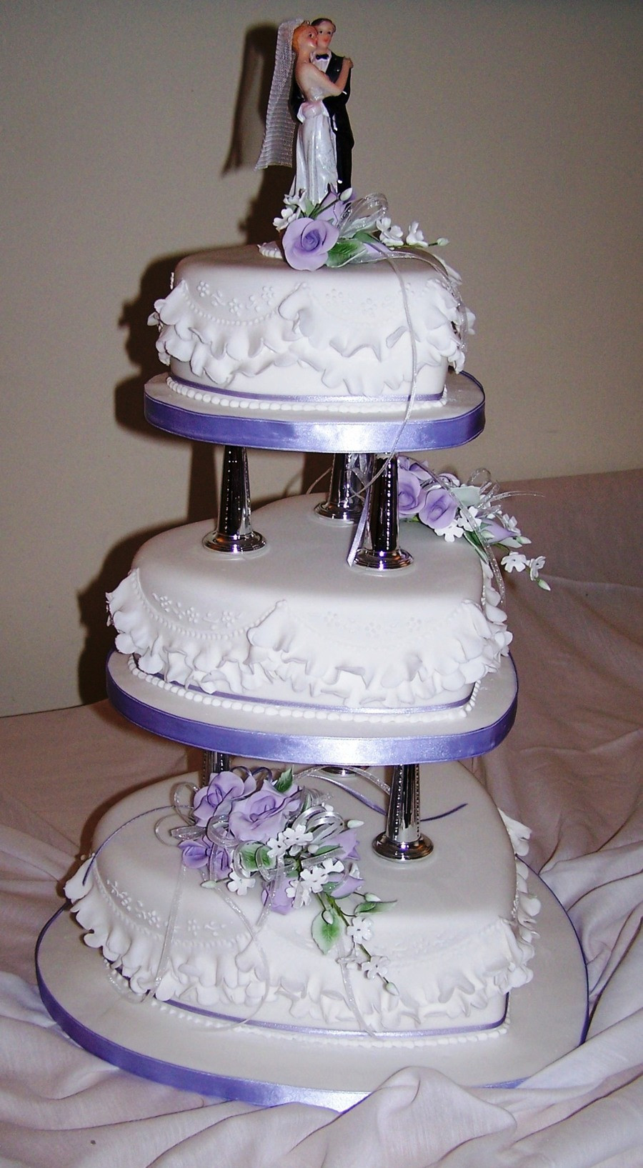 Wedding Cakes Tiered
 3 Tier Heart Shaped Cake Pillars With Gumpaste Flowers