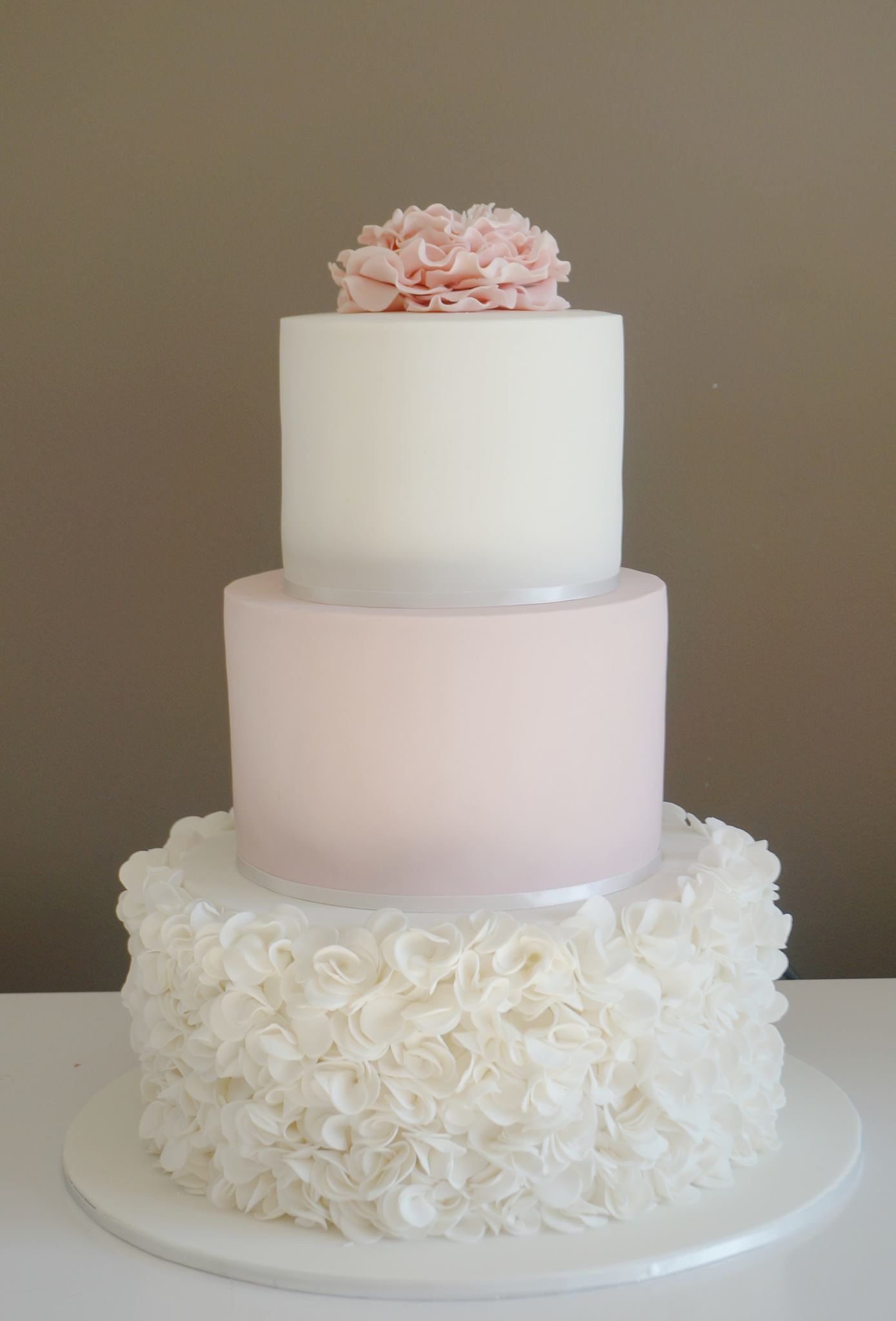 Wedding Cakes Tiered
 PINK AND WHITE WEDDING CAKE VERY PRETTY 3 tier cake with