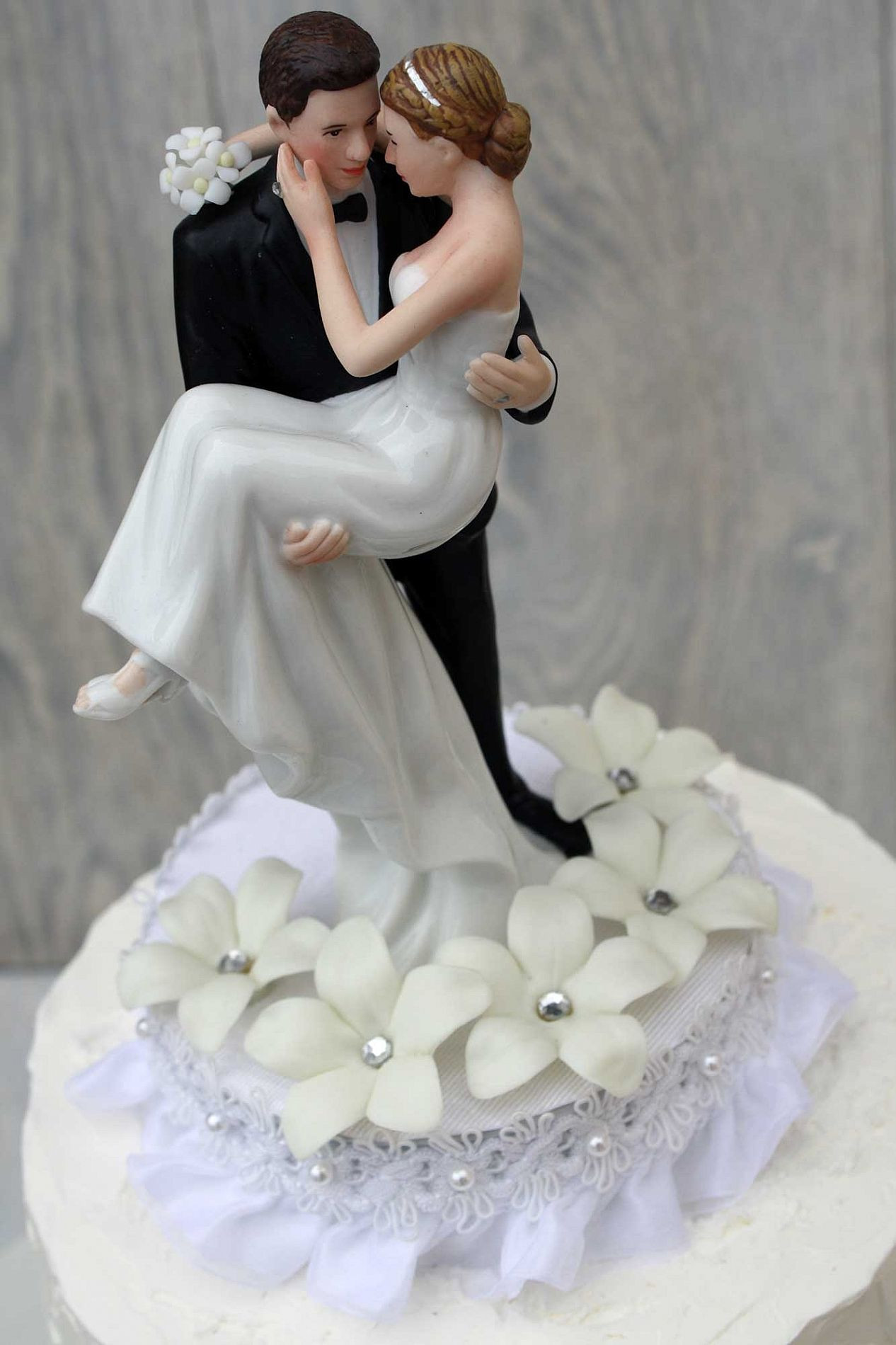 Wedding Cakes Top
 Stephanotis Groom Holding the Bride Wedding Cake Topper