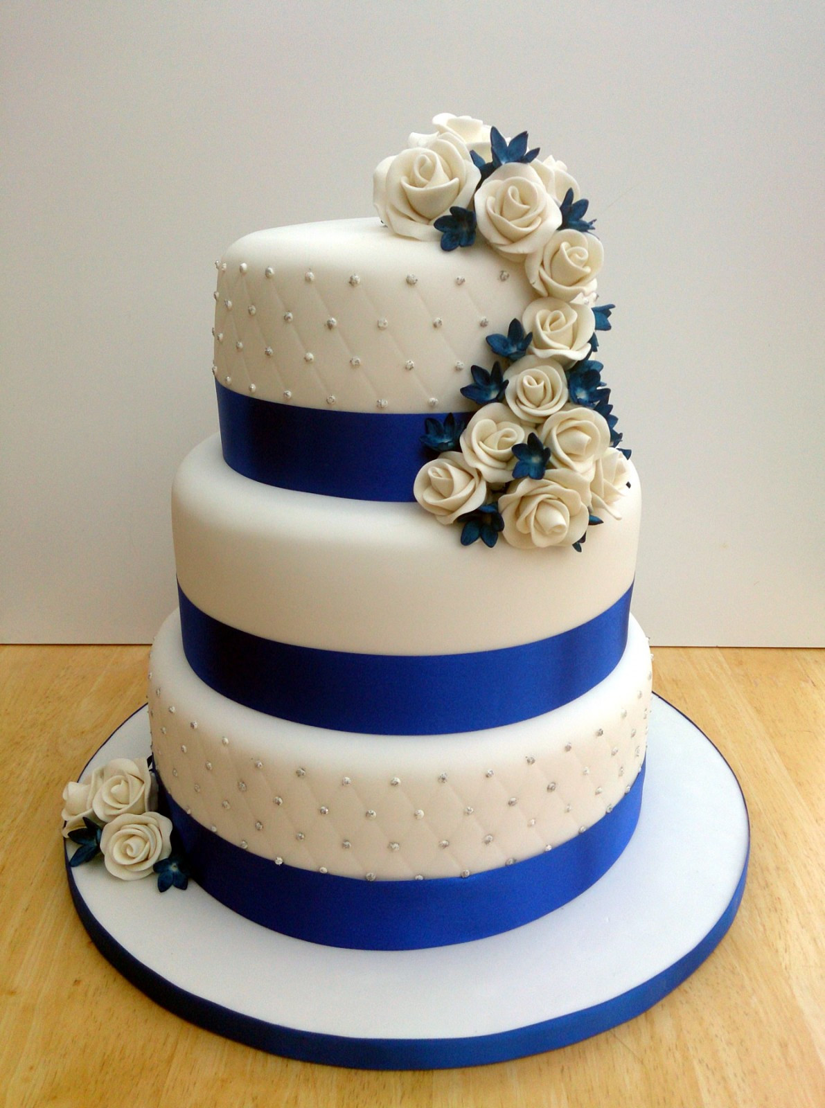 Wedding Cakes With Blue
 3 Tier Round Stacked Wedding Cake With Sapphire Blue and